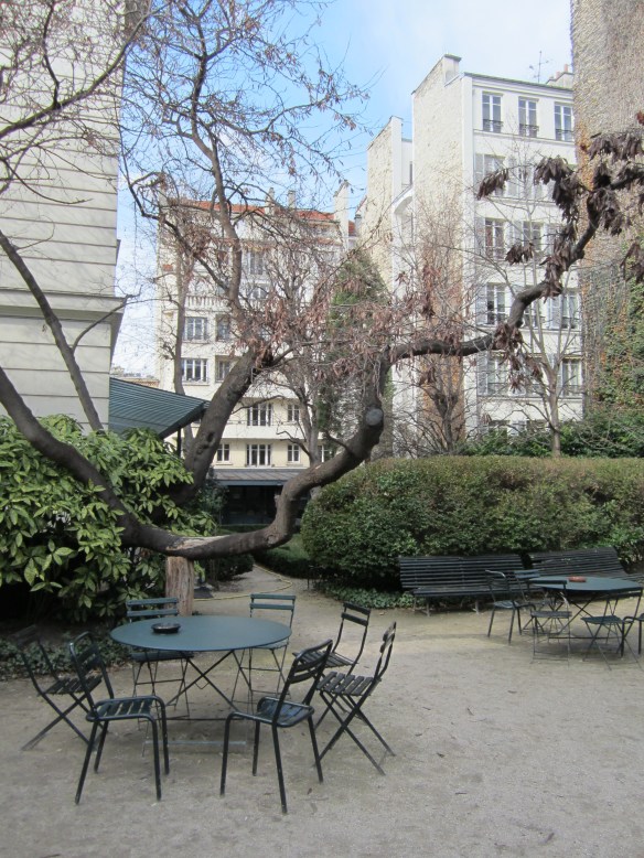 Courtyard seating at the Reid Center today. I wonder how old that tree is?