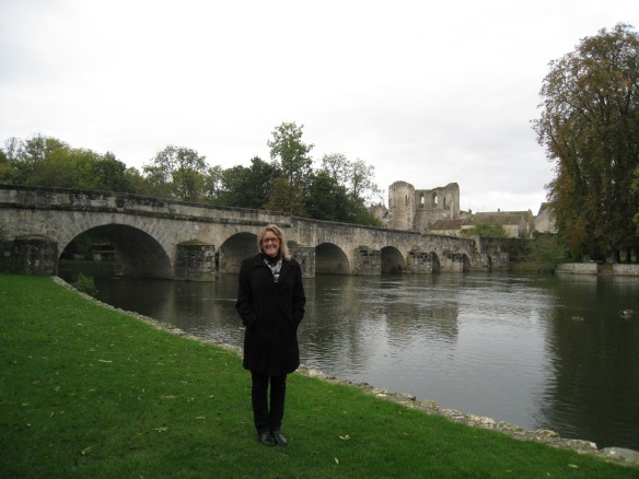 Standing in front of the bridge at Grez-sur-Loing in 2012.