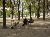 My friends and I enjoying a fall day in my favorite Luxembourg chairs. For my fellow Francophiles: did you know you can order these chairs and have them shipped to the United States? Check out the website of Deyrolle at 46 rue de Bac in Paris. (Which just happens to be the same taxidermy shop filmed in Midnight in Paris.) If you can't find the chairs on their website, you can always try to email them. I came **this close** to ordering one for my husband last Christmas. We loved them that much.
