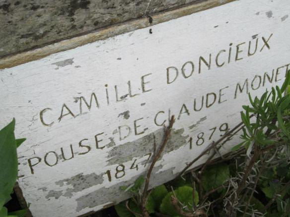 The old grave marker. There is no mention of her married name.