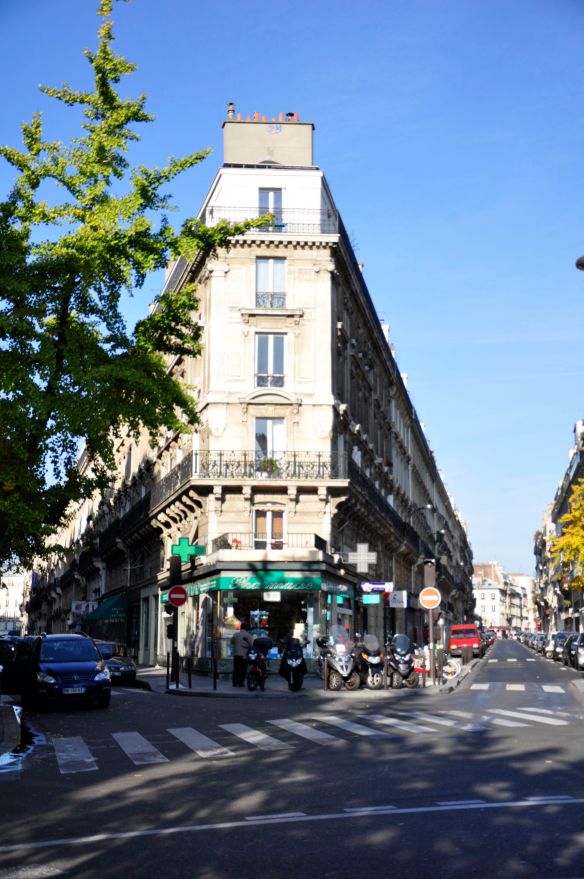 The scene of Caillebotte's Paris Street; Rainy Day (1877)