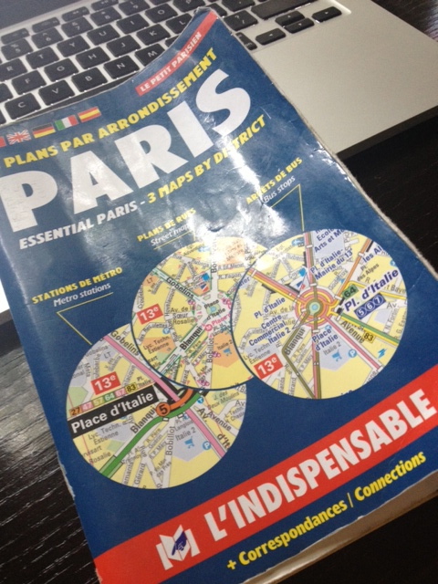 My dog-eared L'Indispensable Paris Arrodissement Map. My own personal Rosetta Stone.