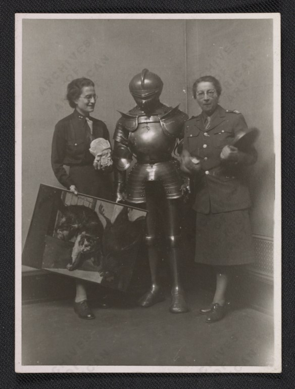 Rose Valland (on the right) and Edith Standen posing with art being returned to France in 1946